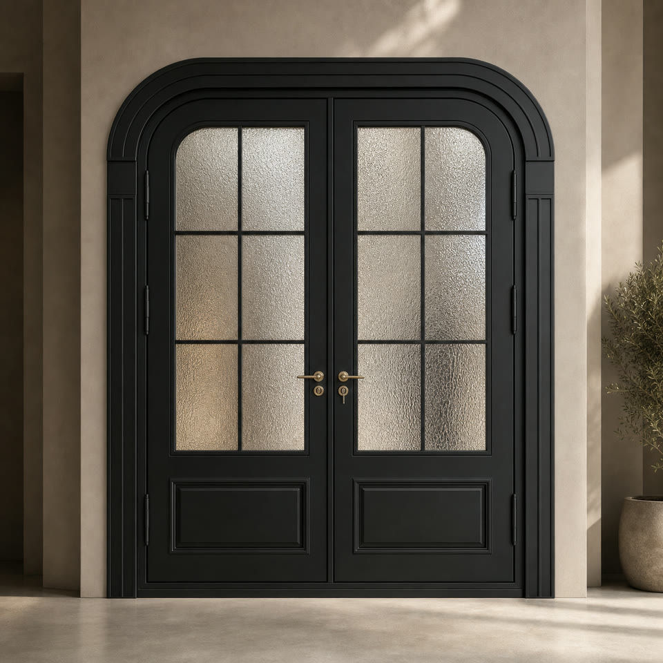 Black arched double entry door with fluted glass panels