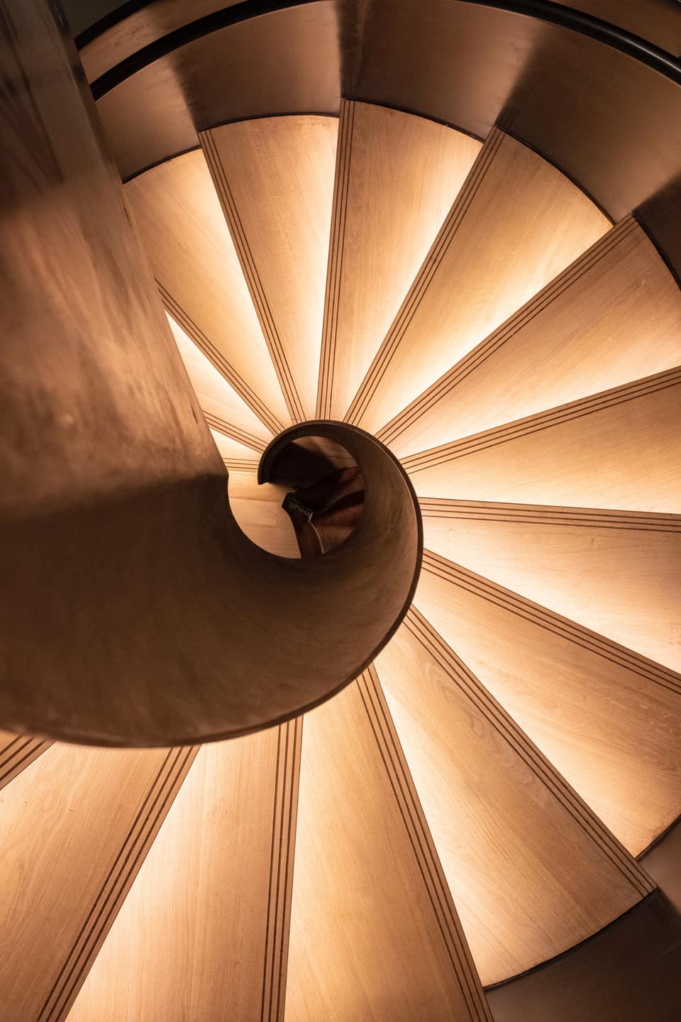 Custom spiral staircase in blackened steel, Toorak
